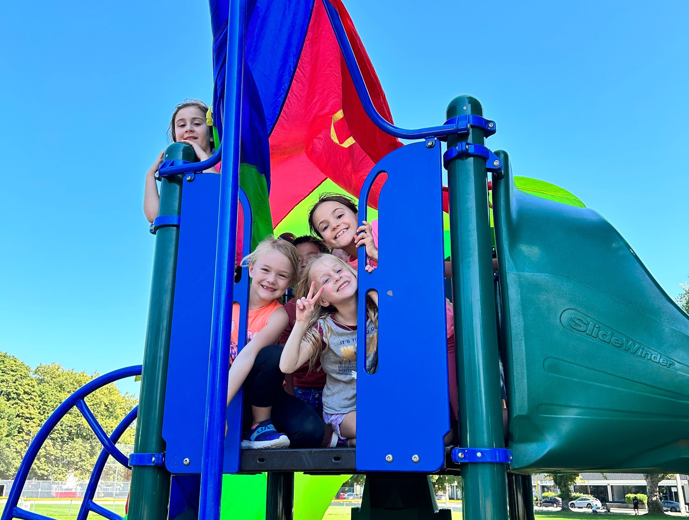 Kids posing for a photo on the playground